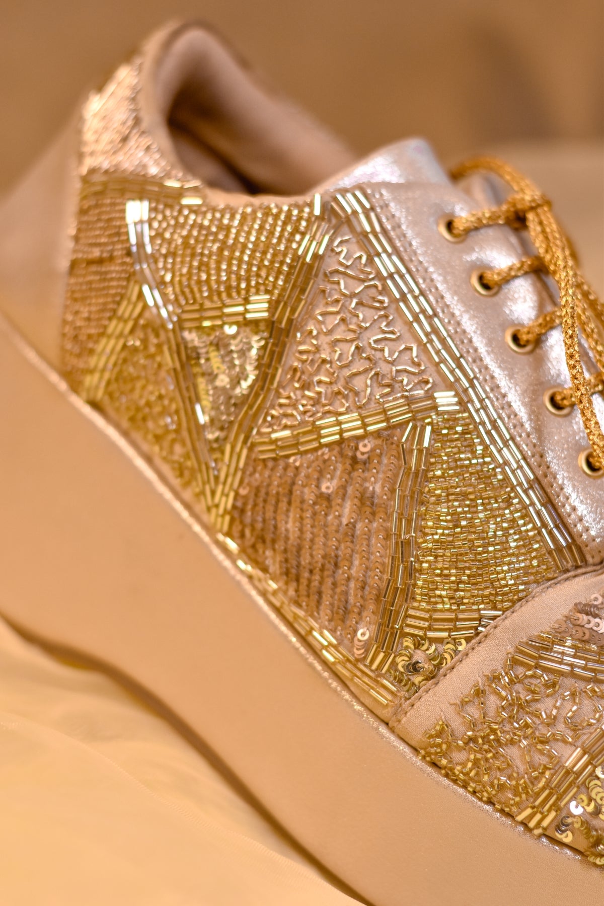 Embellished golden heels sneakers for Indian weddings worldwide