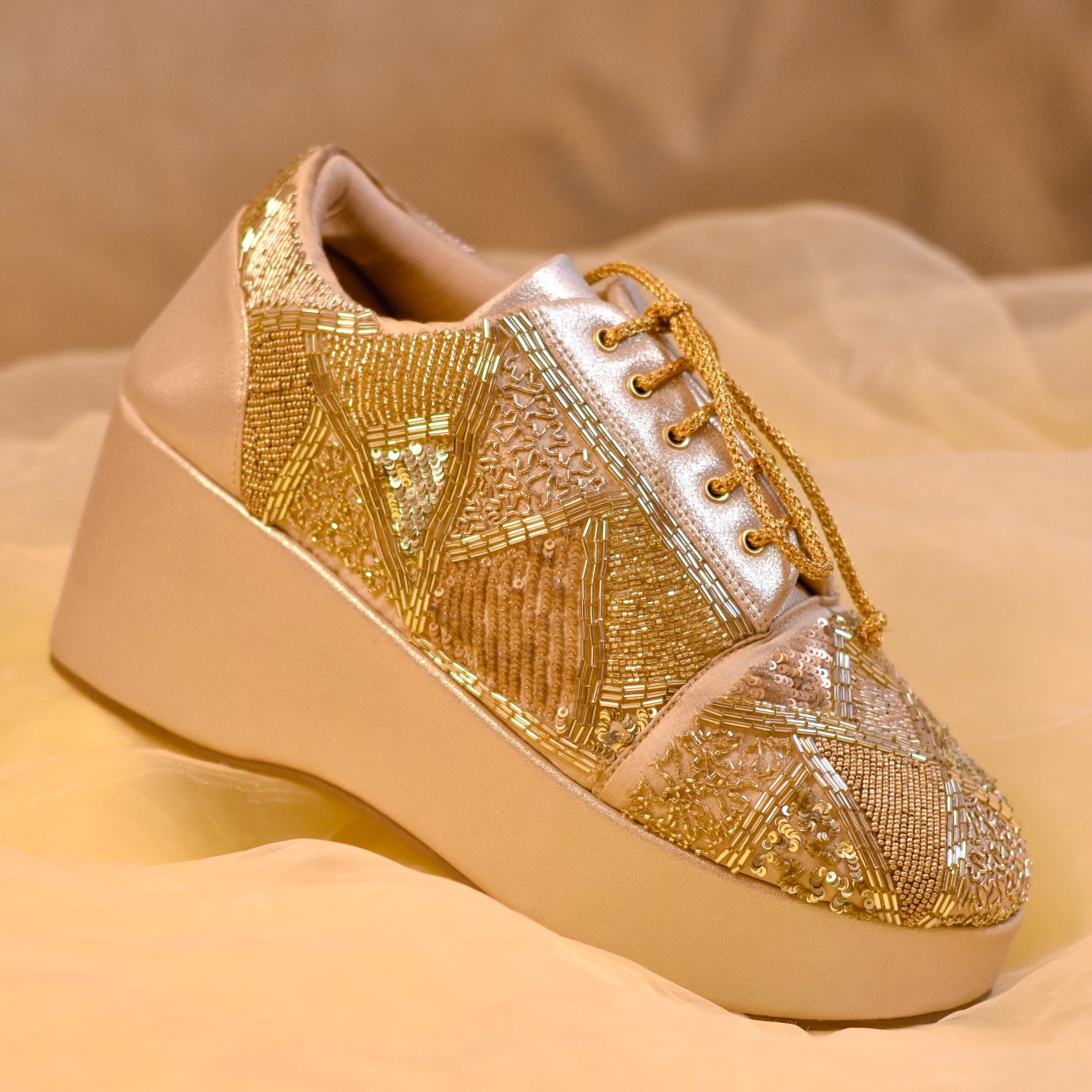 Golden hand embroidered and handmade stylish sneakers for women 