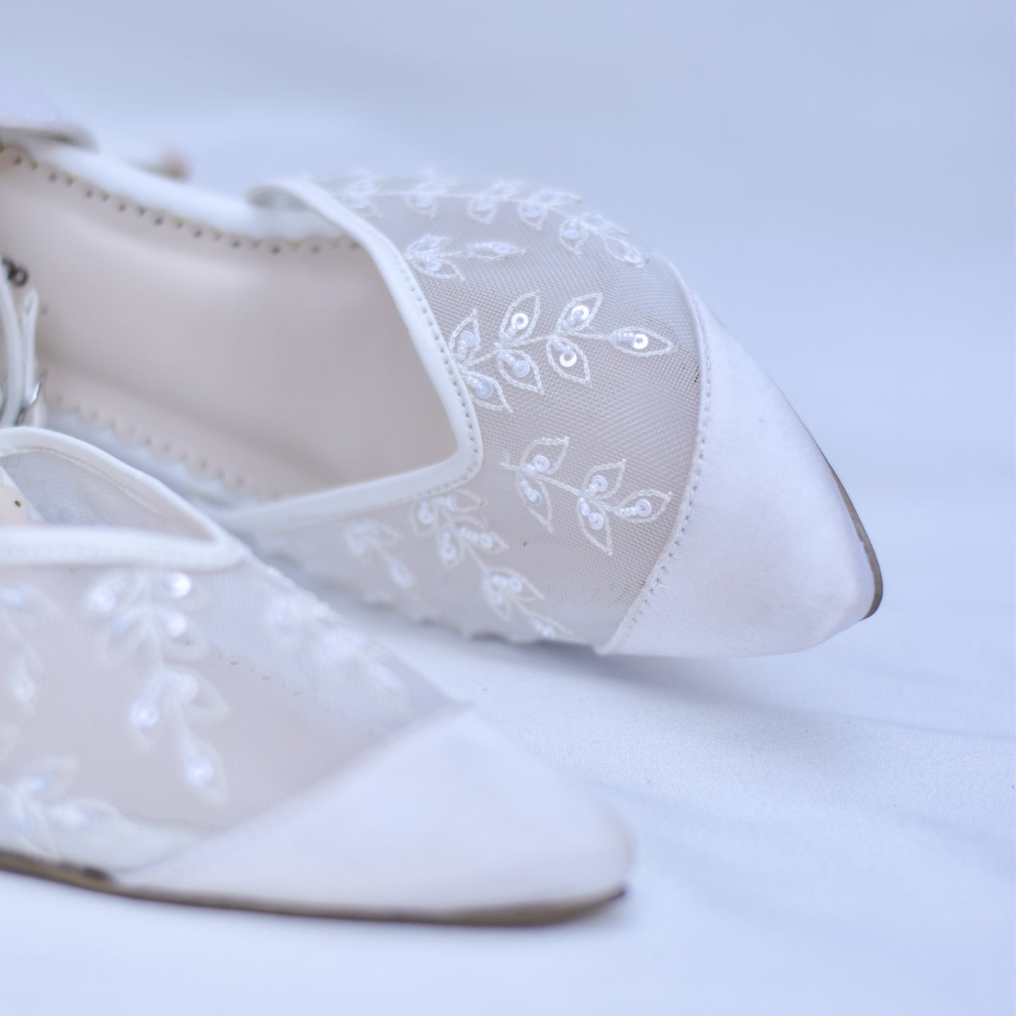 Premium white mules with Indian craftsmanship 