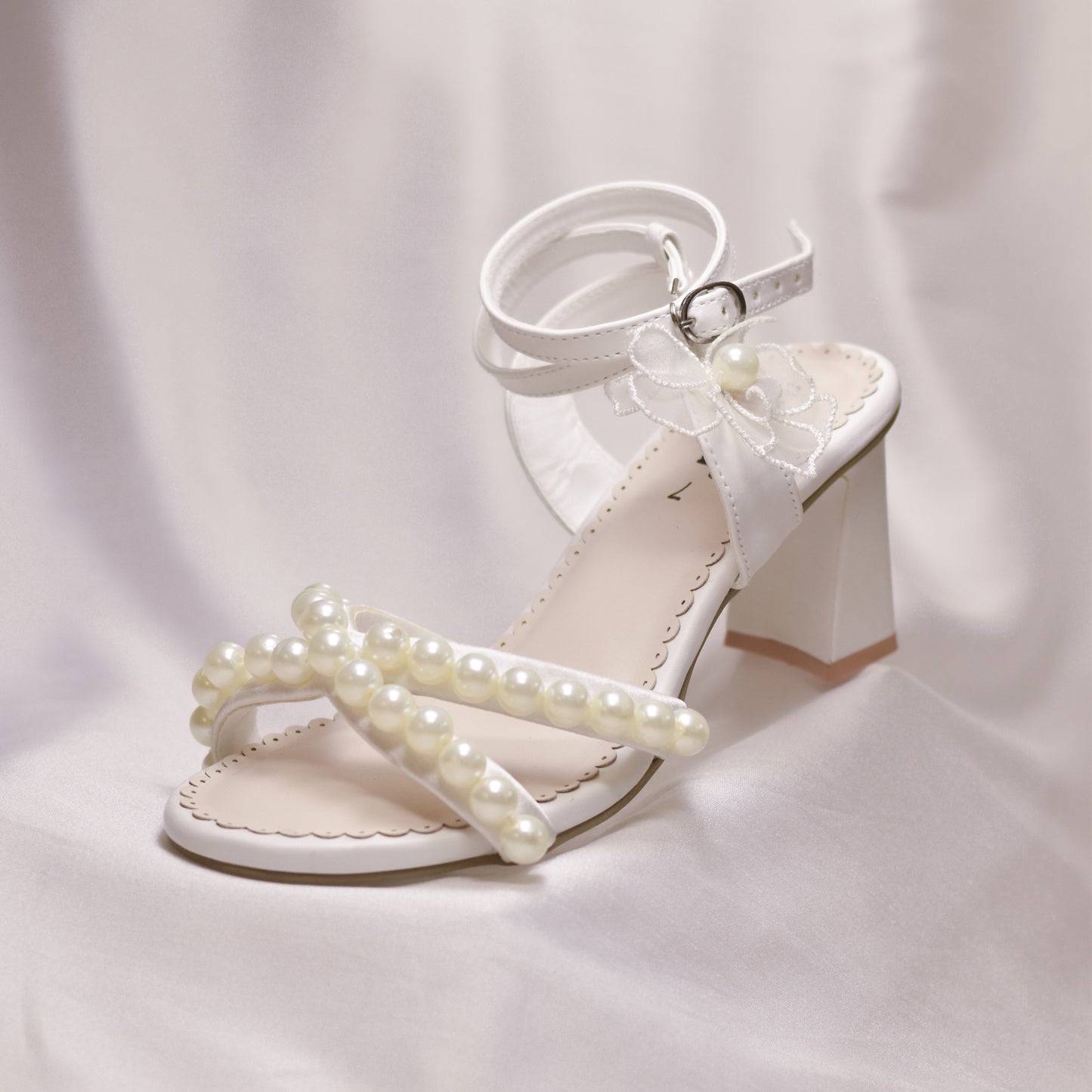 White strappy heels for wedding with 3D flowers