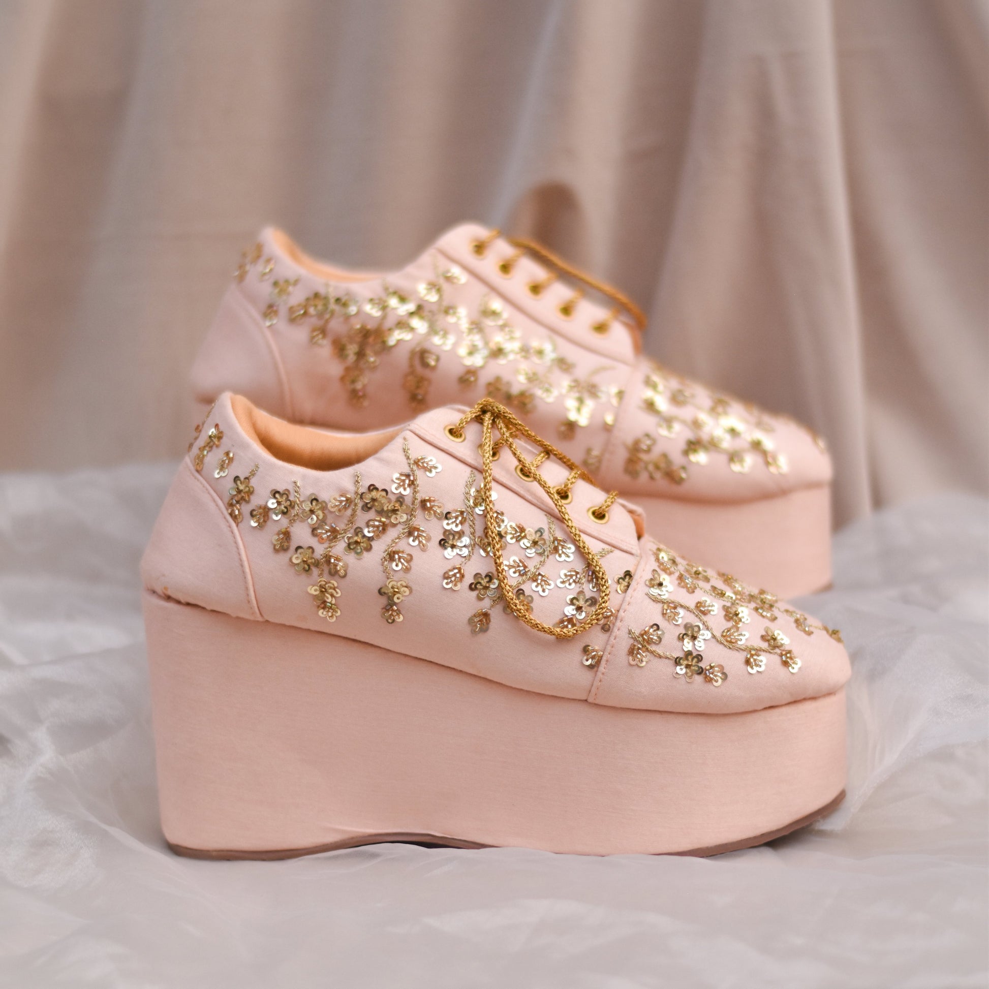 Pastel colour wedding sneakers with golden embroidery