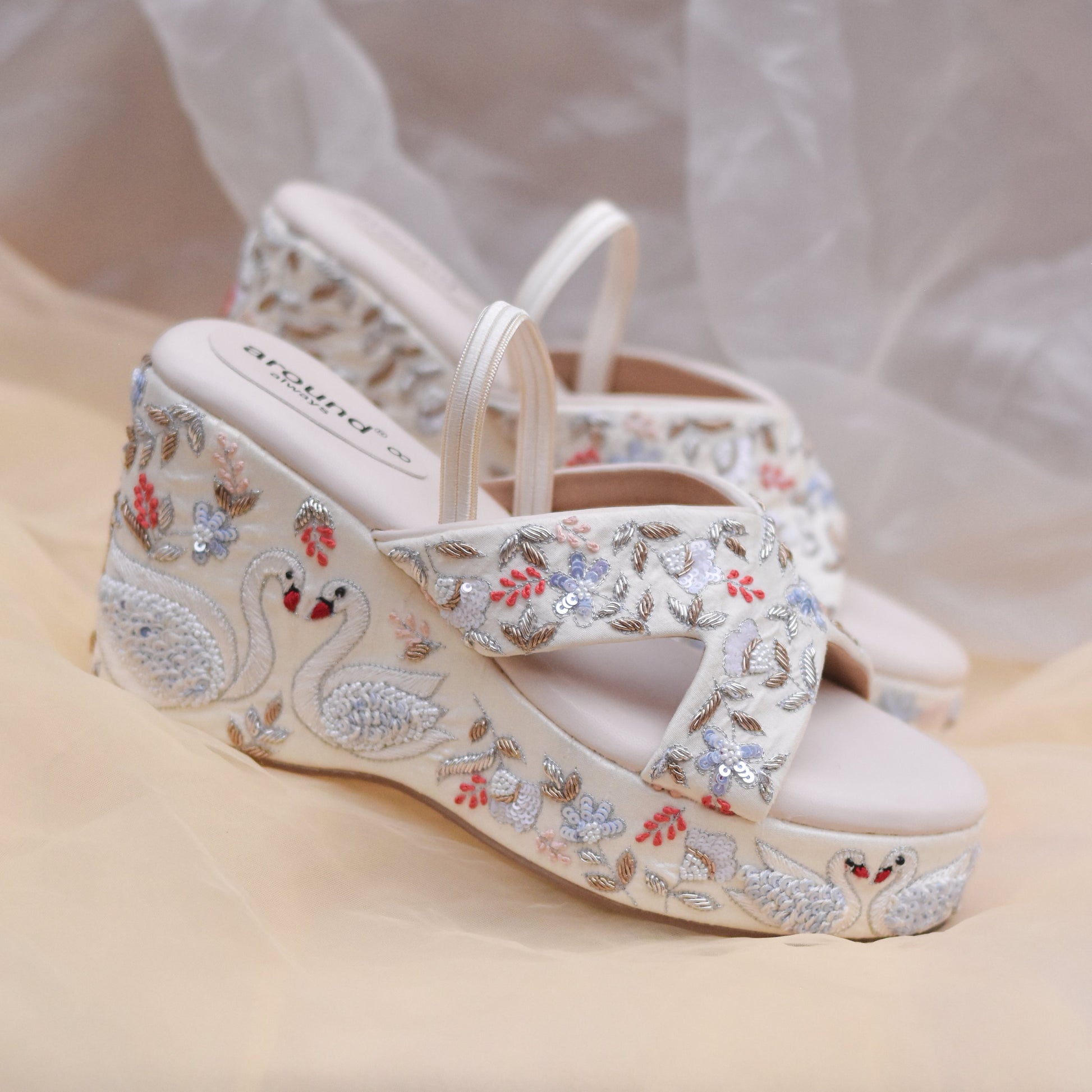 White bridal heels with gorgeous hand embroidery