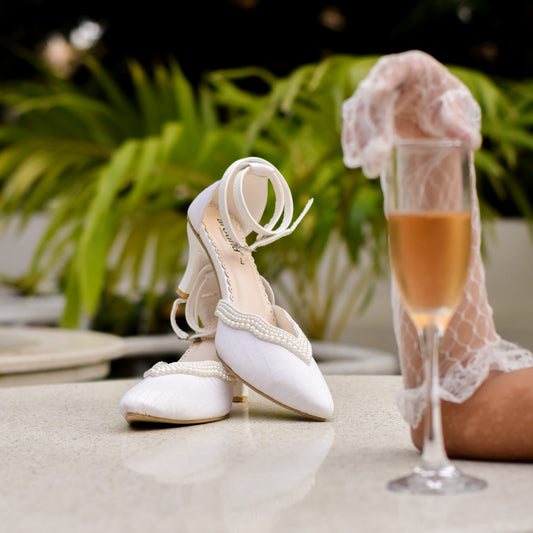 Premium white wedding heels with pearl hand work