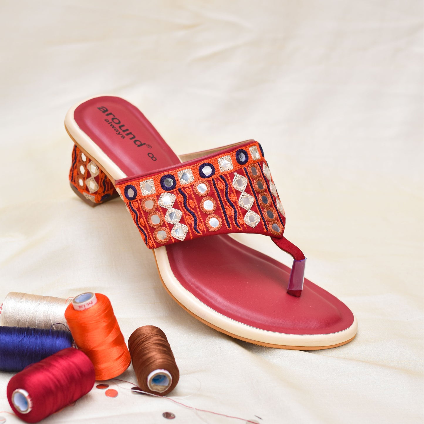 Open toe Kolhapuri chappals with embroidered mirror heels