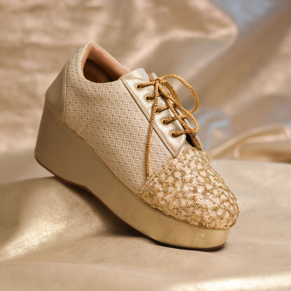 Golden sneakers with heels for a classic Indian look