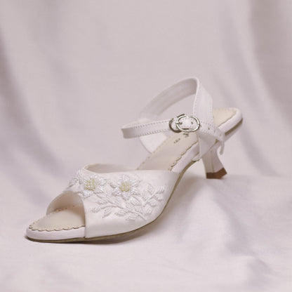 Stylish white sandals for bridesmaids