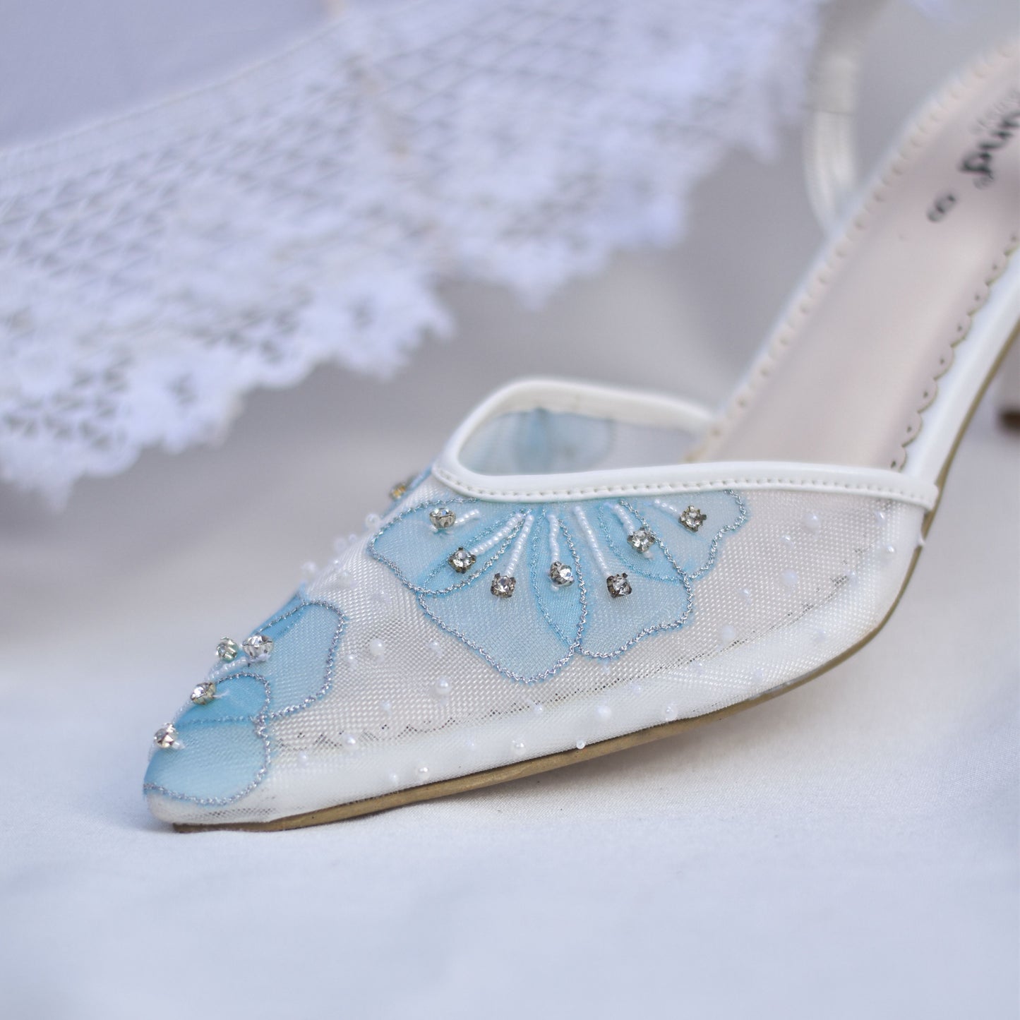 Embroidered patchwork mules for Christian brides 