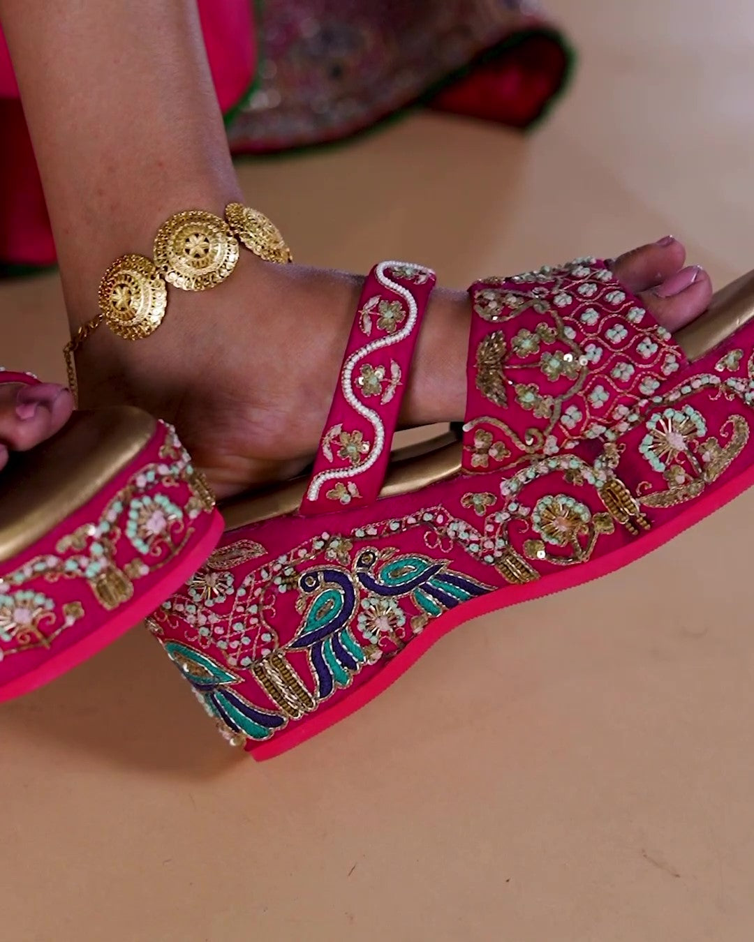 Couture bridal heels with hand embroidered peacock motif