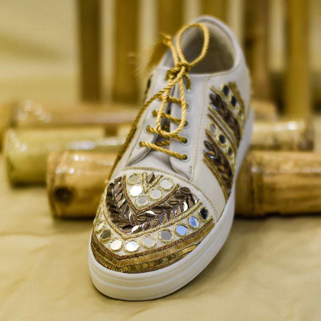 Gold best sale designer sneakers